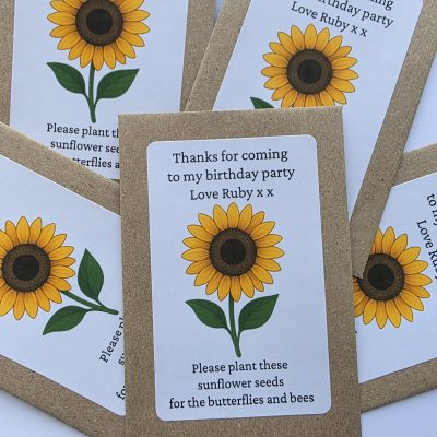 Personalised sunflower seed packet birthday party favour in kraft envelope with sunflower sticker